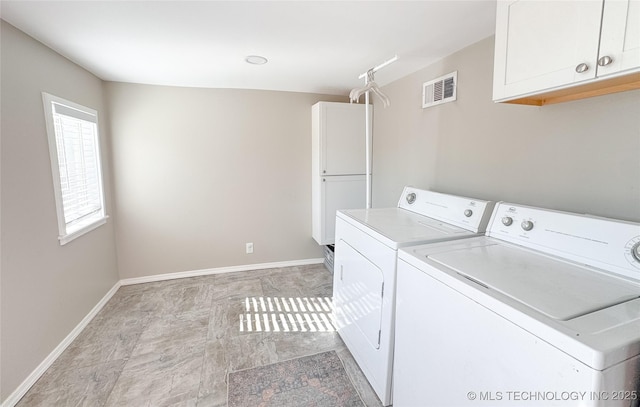 511 N Main St, Sand Springs, OK 74063 - laundry room with cabinet space, washing machine and clothes dryer, and baseboards