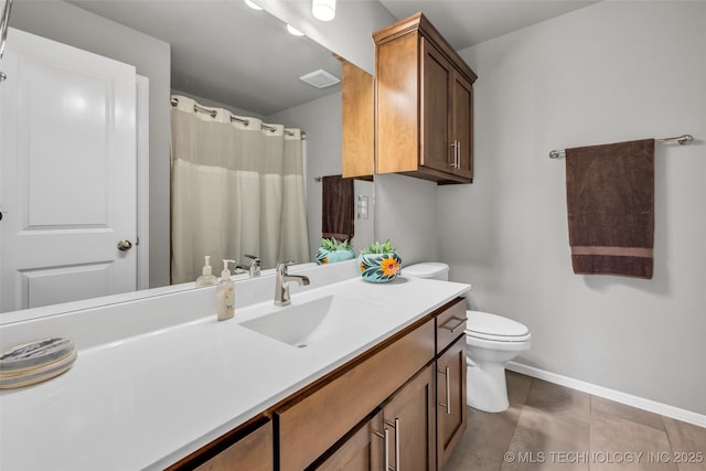 11439 N 162nd E Ave, Owasso, OK 74055 - full bath with toilet, baseboards, vanity, and tile patterned floors