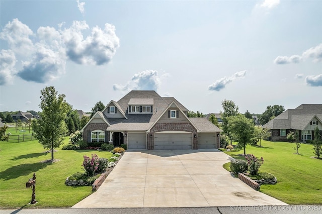 11439 N 162nd E Ave, Owasso, OK 74055 - craftsman-style house with brick siding, driveway, a front lawn, and an attached garage