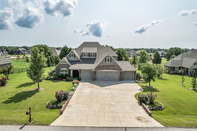 11439 N 162nd E Ave, Owasso, OK 74055 - view of front of house with brick siding, driveway, and a residential view