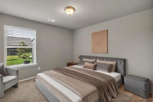 11439 N 162nd E Ave, Owasso, OK 74055 - bedroom featuring baseboards