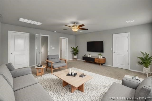 11439 N 162nd E Ave, Owasso, OK 74055 - living area with a ceiling fan and baseboards