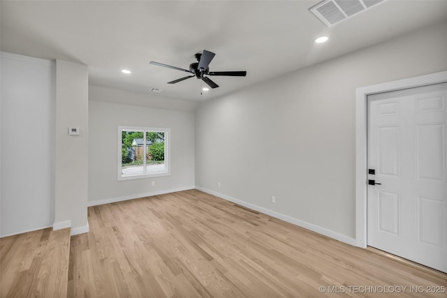 unfurnished room with light wood-type flooring, a ceiling fan, visible vents, and recessed lighting