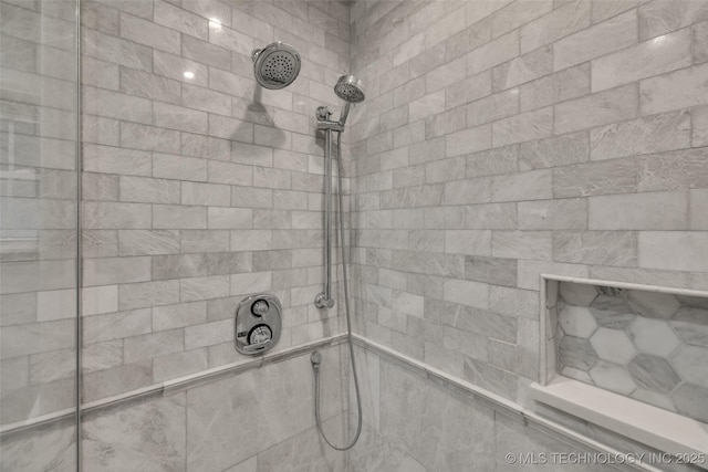 details with a tile shower
