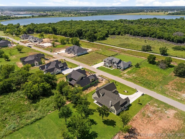 17822 E Patriot Dr, Owasso, OK 74055 - aerial view of residential area featuring a large body of water