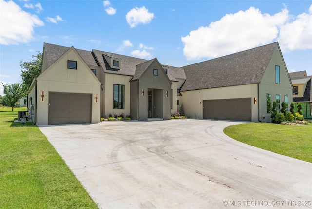 17822 E Patriot Dr, Owasso, OK 74055 - view of front facade with stucco siding, concrete driveway, and a shingled roof