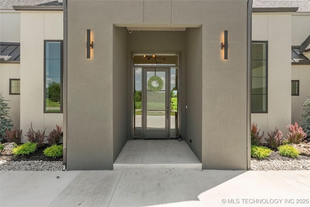 17822 E Patriot Dr, Owasso, OK 74055 - view of exterior entry with stucco siding