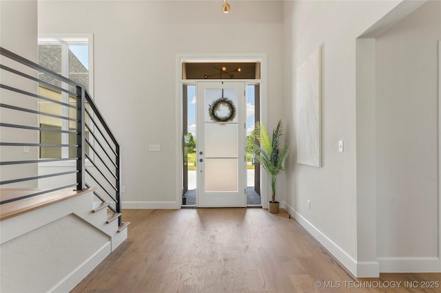 17822 E Patriot Dr, Owasso, OK 74055 - foyer entrance featuring wood finished floors and stairs