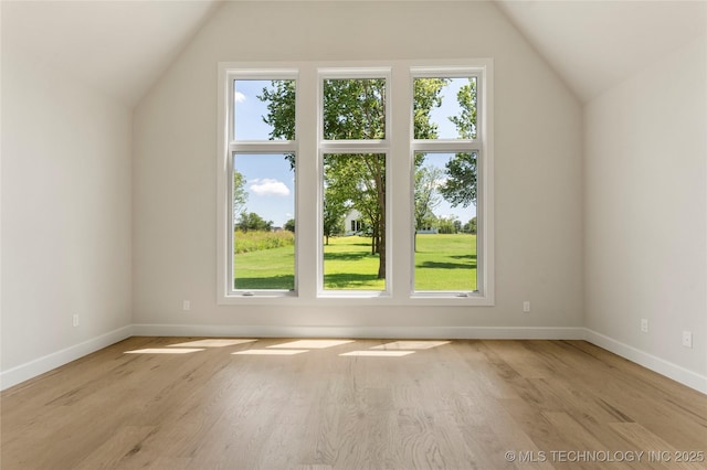 17822 E Patriot Dr, Owasso, OK 74055 - bonus room featuring lofted ceiling and wood finished floors