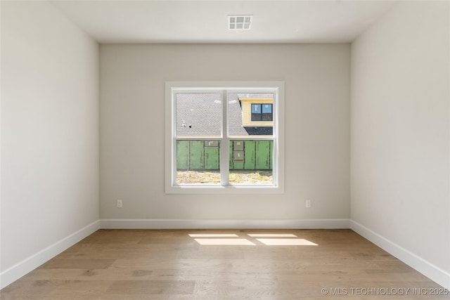 17822 E Patriot Dr, Owasso, OK 74055 - unfurnished room with wood finished floors and baseboards