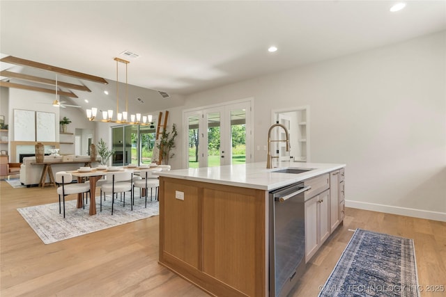 17822 E Patriot Dr, Owasso, OK 74055 - kitchen featuring stainless steel dishwasher, recessed lighting, open floor plan, a kitchen island with sink, and decorative light fixtures