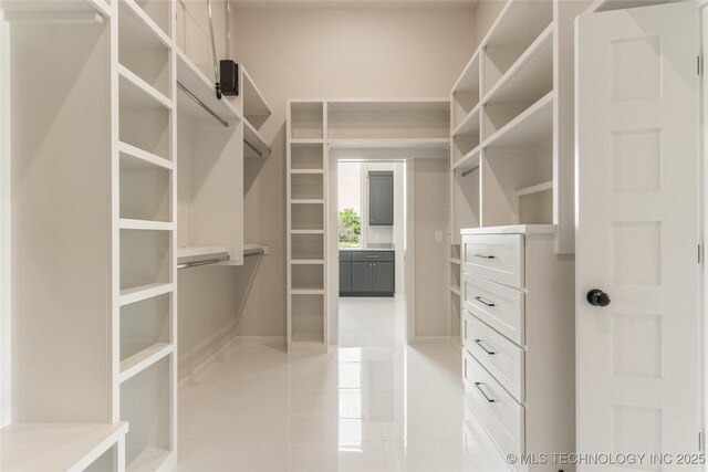 17822 E Patriot Dr, Owasso, OK 74055 - walk in closet with light tile patterned floors