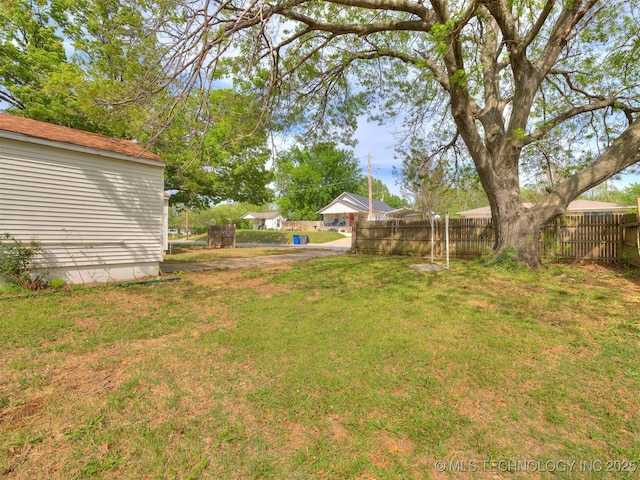 view of yard with fence