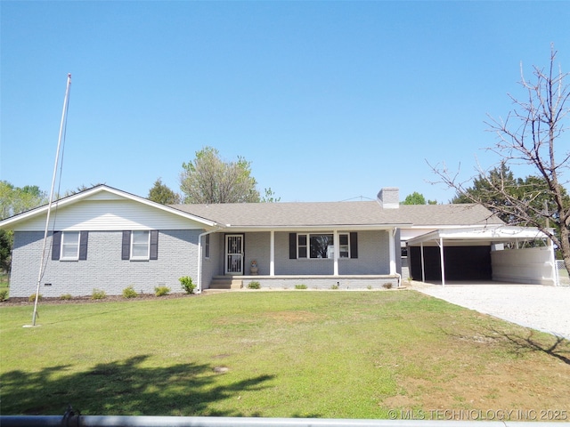 16893 E 116th St N, Owasso, OK 74055 - single story home featuring a chimney, an attached carport, a front yard, brick siding, and gravel driveway