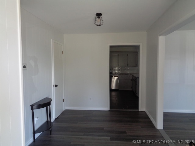 16893 E 116th St N, Owasso, OK 74055 - hallway with baseboards and dark wood finished floors