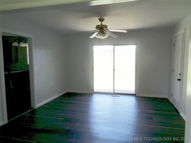 16893 E 116th St N, Owasso, OK 74055 - empty room featuring baseboards, ceiling fan, and wood finished floors