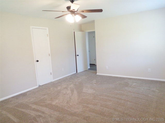 16893 E 116th St N, Owasso, OK 74055 - unfurnished bedroom with carpet flooring, baseboards, and ceiling fan