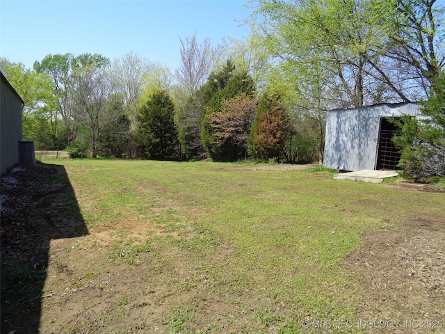 16893 E 116th St N, Owasso, OK 74055 - view of green lawn featuring an outdoor structure