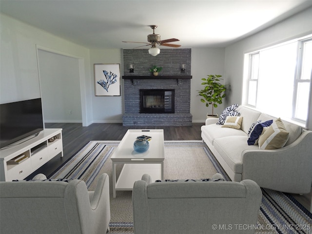 16893 E 116th St N, Owasso, OK 74055 - living room with a ceiling fan, wood finished floors, and a fireplace
