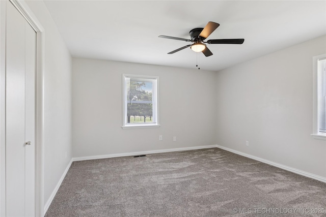 16893 E 116th St N, Owasso, OK 74055 - unfurnished bedroom with carpet floors and ceiling fan