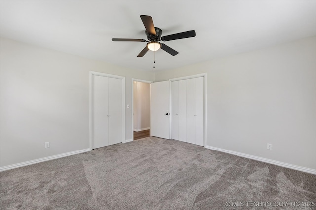 16893 E 116th St N, Owasso, OK 74055 - unfurnished bedroom with carpet flooring, multiple closets, and ceiling fan