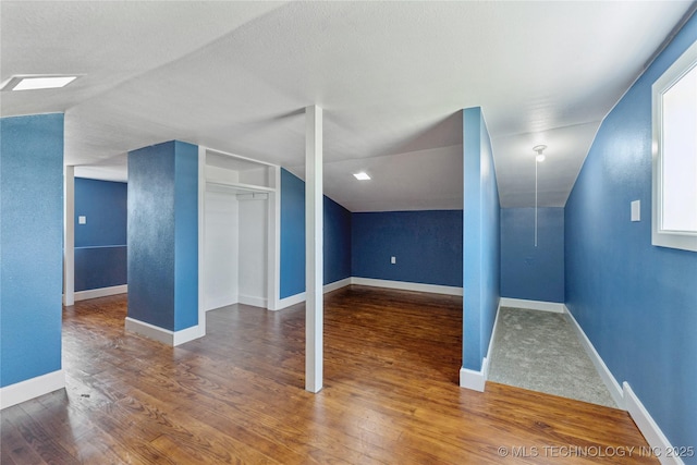 16893 E 116th St N, Owasso, OK 74055 - bonus room featuring wood finished floors and vaulted ceiling