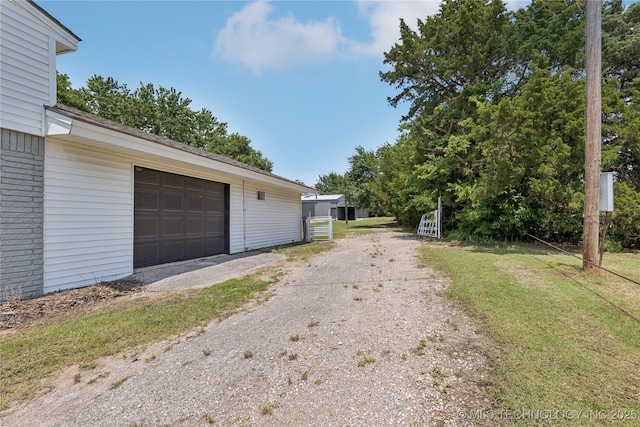 16893 E 116th St N, Owasso, OK 74055 - detached garage featuring driveway