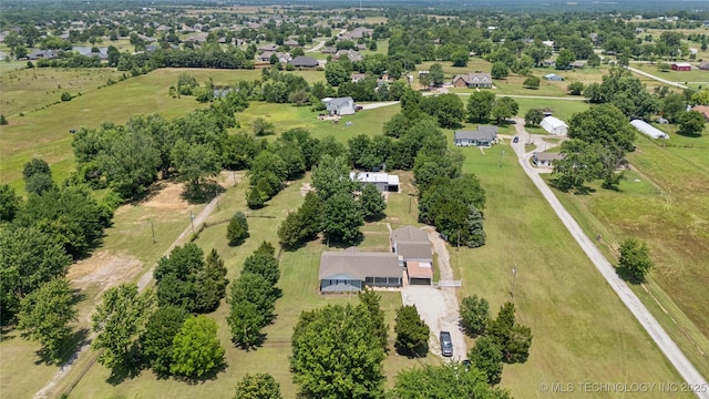 16893 E 116th St N, Owasso, OK 74055 - aerial overview of property's location with a tree filled landscape