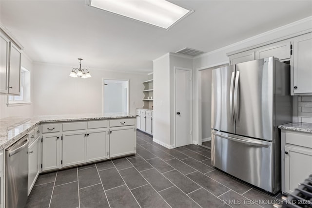 16893 E 116th St N, Owasso, OK 74055 - kitchen with appliances with stainless steel finishes, a chandelier, dark tile patterned floors, ornamental molding, and light stone counters