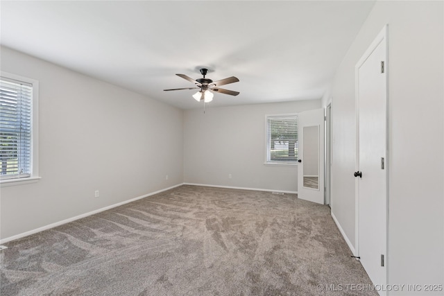 16893 E 116th St N, Owasso, OK 74055 - empty room featuring ceiling fan and carpet