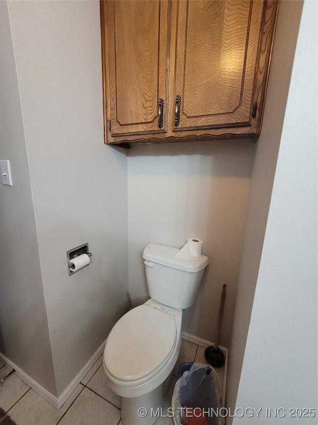 351 Hamilton Rd, Eufaula, OK 74432 - bathroom with baseboards, tile patterned flooring, and toilet