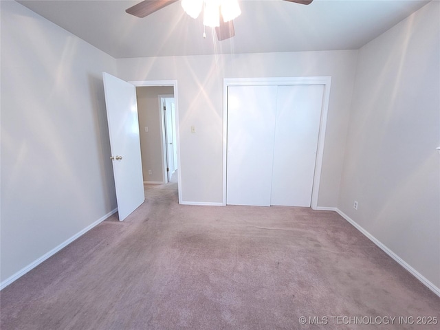 351 Hamilton Rd, Eufaula, OK 74432 - unfurnished bedroom featuring carpet floors, a ceiling fan, and baseboards