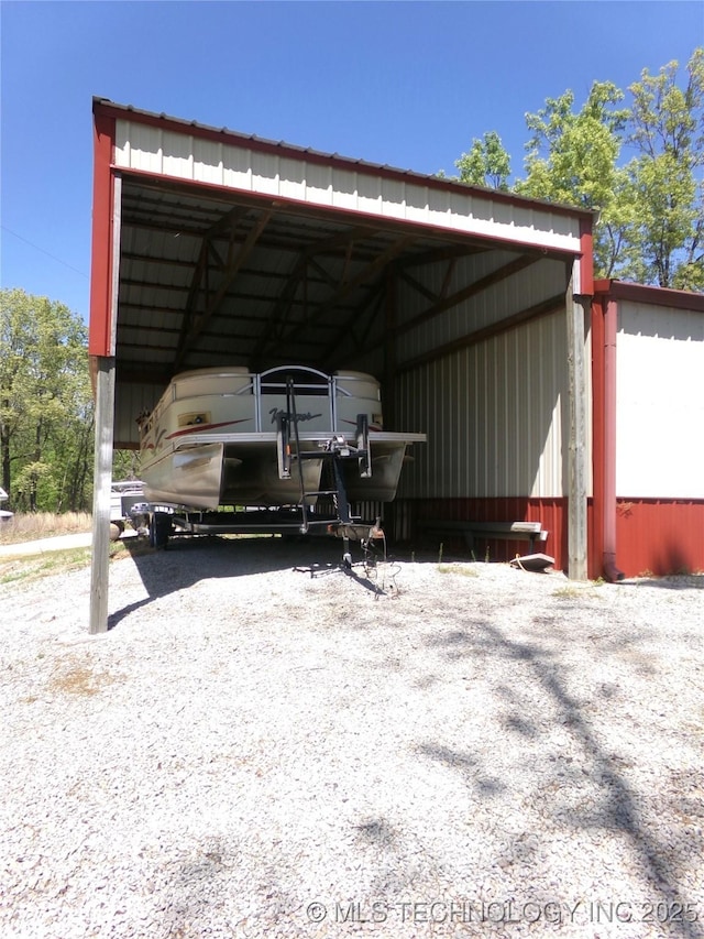 107349 S 4091st Rd, Checotah, OK 74426 - view of parking / parking lot with a detached carport and an outbuilding