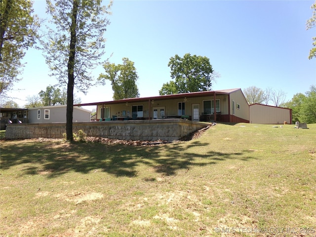 107349 S 4091st Rd, Checotah, OK 74426 - back of house with a yard