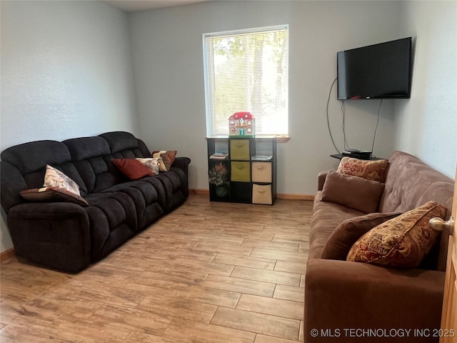 107349 S 4091st Rd, Checotah, OK 74426 - living area featuring light wood-style flooring and baseboards