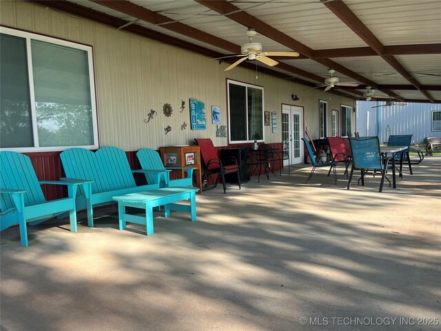 107349 S 4091st Rd, Checotah, OK 74426 - view of patio with french doors, outdoor dining area, and a ceiling fan