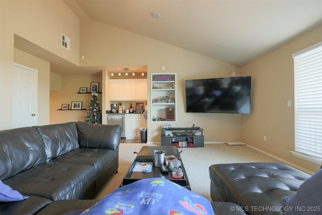 living room featuring high vaulted ceiling, carpet floors, visible vents, and baseboards