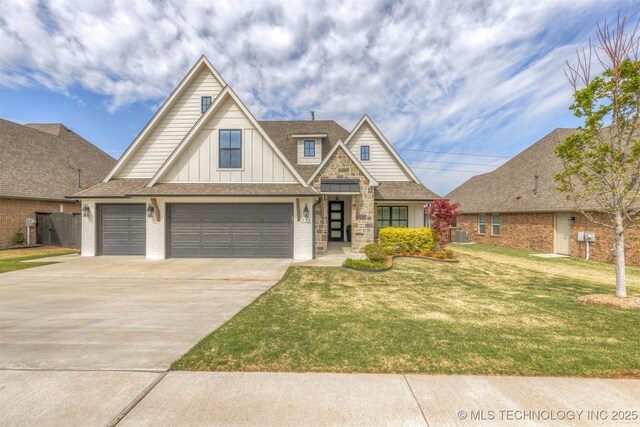 craftsman-style home with board and batten siding, driveway, a front yard, brick siding, and a garage
