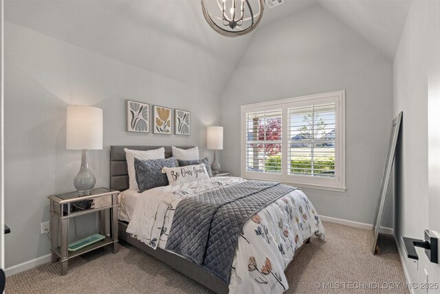 bedroom with a chandelier, lofted ceiling, carpet, and baseboards
