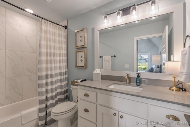 ensuite bathroom featuring toilet, vanity, and shower / tub combo with curtain