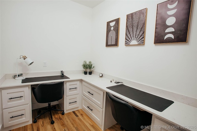 9520 N 144th Ave E, Owasso, OK 74055 - office with built in desk and light wood finished floors