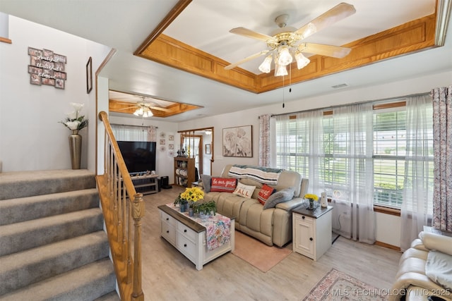 10495 S 426th Rd, Inola, OK 74036 - living area with a raised ceiling, a ceiling fan, light wood finished floors, and plenty of natural light