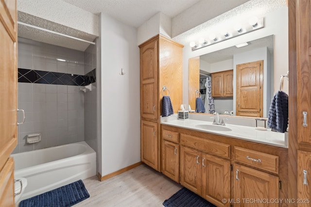 10495 S 426th Rd, Inola, OK 74036 - bathroom featuring wood finished floors, vanity, shower / tub combination, and a textured ceiling