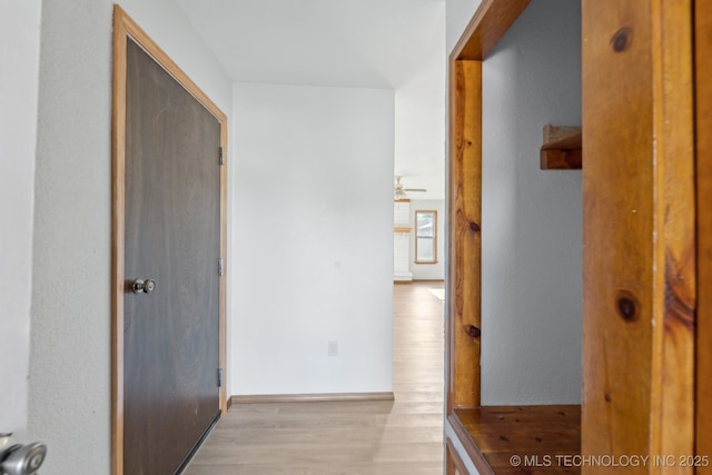 13973 S Hickory St, Glenpool, OK 74033 - hallway featuring baseboards and light wood finished floors