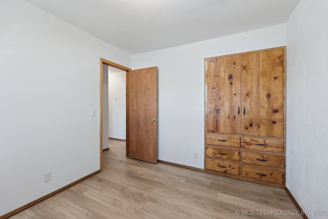 13973 S Hickory St, Glenpool, OK 74033 - spare room featuring baseboards and light wood-type flooring