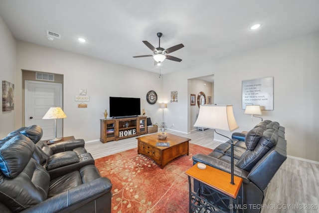 13010 E 125th Pl N, Collinsville, OK 74021 - living room with wood finished floors, ceiling fan, and recessed lighting