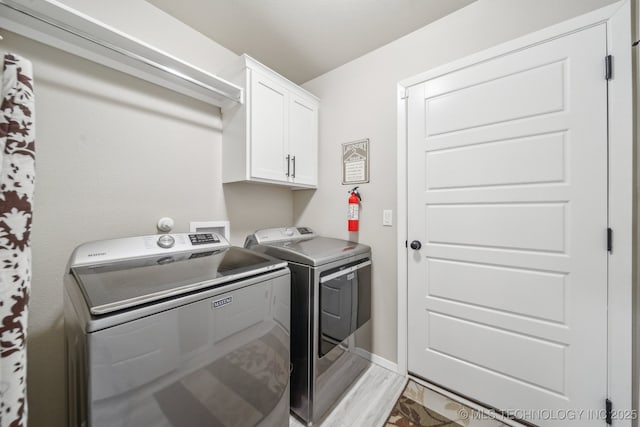 13010 E 125th Pl N, Collinsville, OK 74021 - laundry room featuring separate washer and dryer and cabinet space