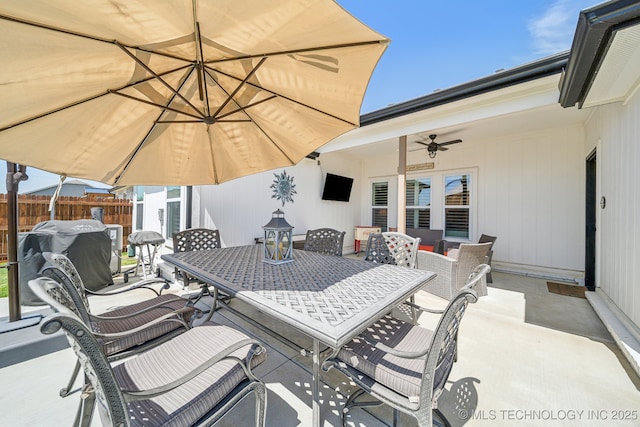 13010 E 125th Pl N, Collinsville, OK 74021 - view of patio / terrace with outdoor dining area and a ceiling fan