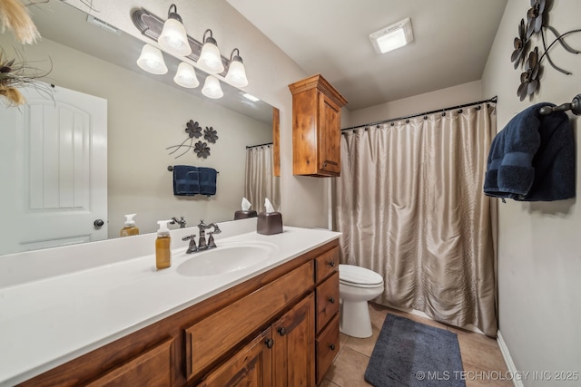 full bathroom featuring a shower with curtain, vanity, tile patterned flooring, and toilet