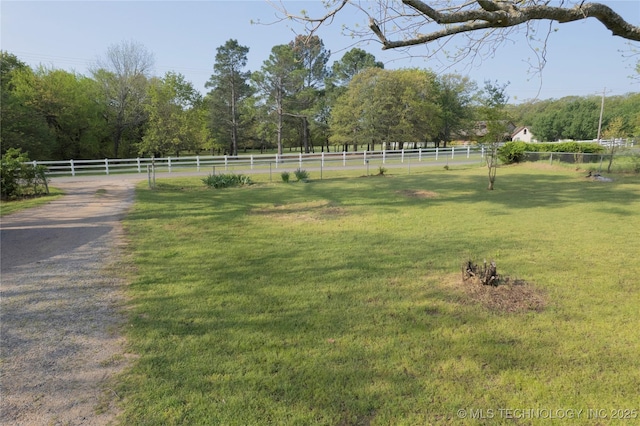 view of yard featuring fence